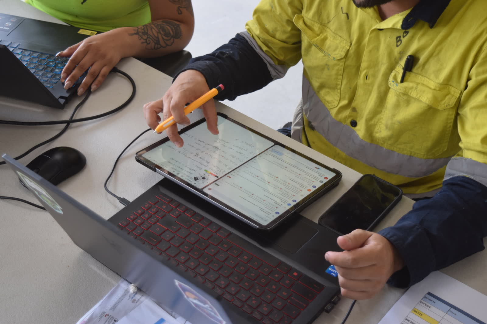 Construction professional reviewing on-site works